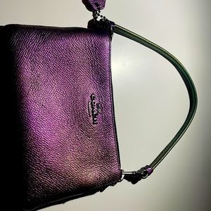 I am selling a coach wristlet! Metallic purple. In good condition